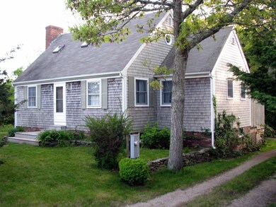 Main house driveway to the right
