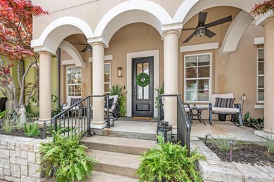 View of exterior entry featuring a porch and stucc