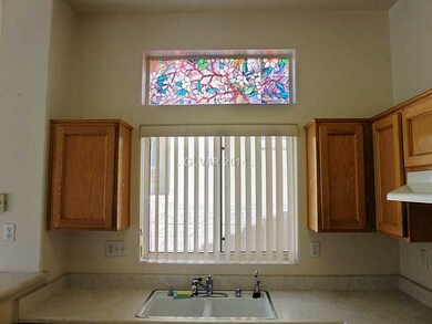 Kitchen. Unique stained glass window look adds a t