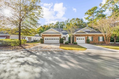 Ranch-style home featuring a garage