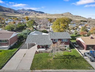 Aerial view of residential area featuring a mountain backdrop