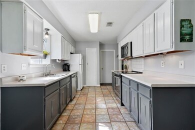 Kitchen with pantry, freshly painted. Garage acces