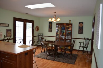 The eat in kitchen offers ample space for a large 