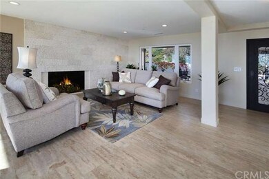 Gorgeous living are with split-face travertine on 