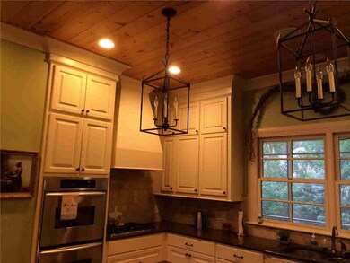 Large kitchen with seating at the bar