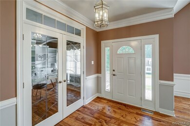 Foyer with crown molding, Hickory solid hand scrap