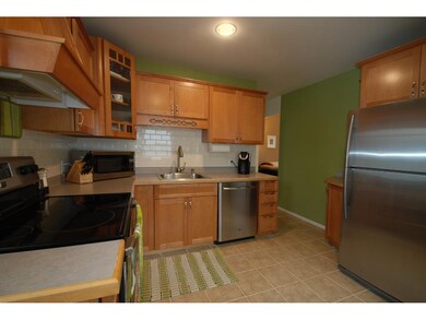 Stylish subway tile backsplash, SS appliances, tou
