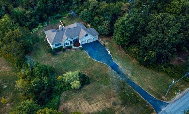 Ariel view of property, sits back off the road or