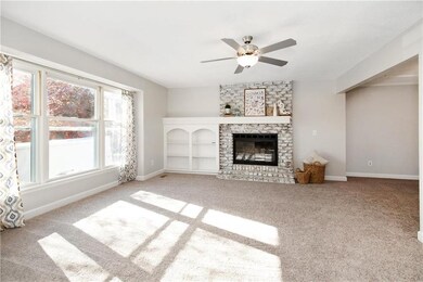 Updates galore! Brand new flooring, light fixtures