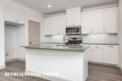 Your chef's dream kitchen awaits!  REPRESENTATIVE 