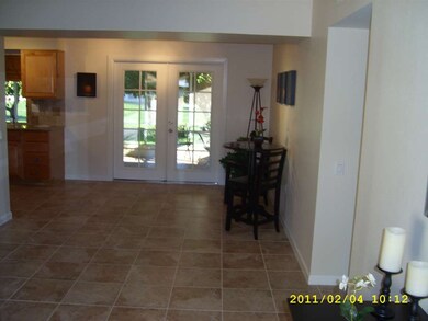 LIVING ROOM TOWARD KITCHEN