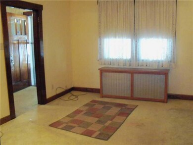 Living Room. Wall to wall carpet flows into the li