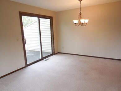 Dining area with patio to large deck