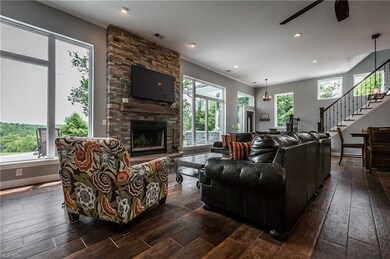 CHECK OUT THE GORGEOUS STONE WOOD BURNING FIREPLAC