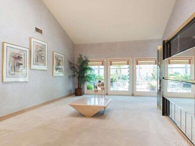 Spacious living room with vaulted ceilings.