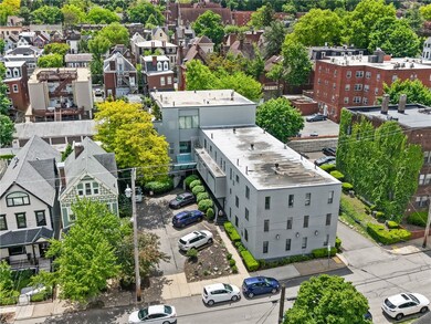 This fantastic Shadyside condo building features o