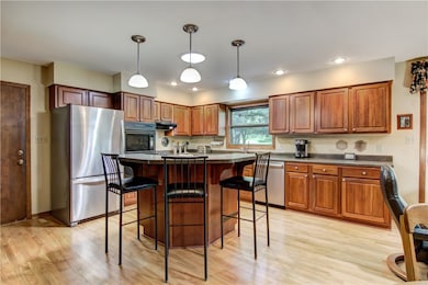 Beautiful kitchen space w/refaced cherry cabinetry