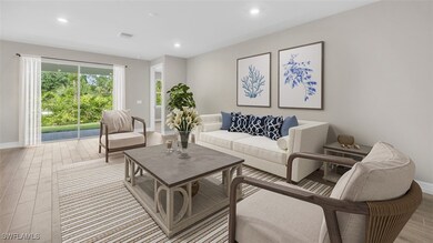 Living area featuring wood finished floors and rec