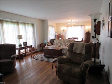 Big living room open to the dining area.