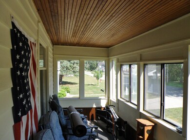 Enclosed porch that is street side