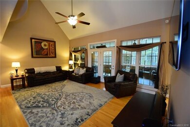 Spacious Great Room with hardwoods, vaulted ceilin