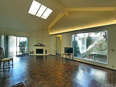 Let the outside in!  Enjoy skylight, slider to bac