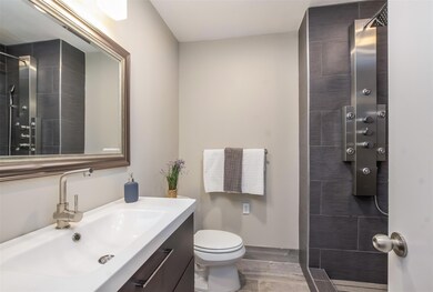 Master Bath with dual shower heads and spray syste
