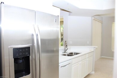 Kitchen featuring light tile patterned flooring, s