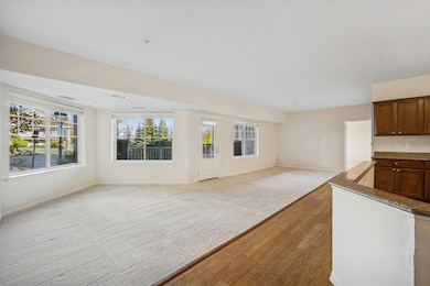 Open floor plan with kitchen open to living and di