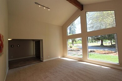 LIVING ROOM WITH PICTURE WINDOWS