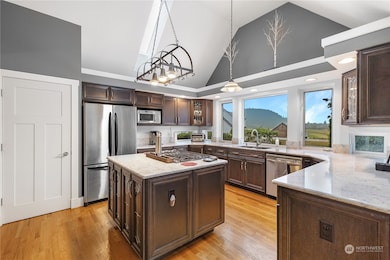 Vaulted Kitchen with custom cabinets and big counters