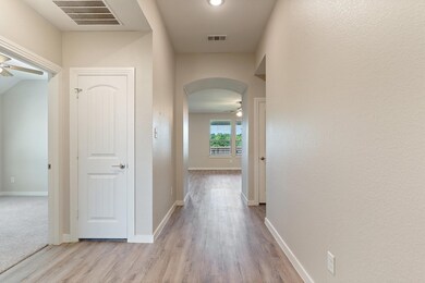 Hallway featuring light wood-type flooring