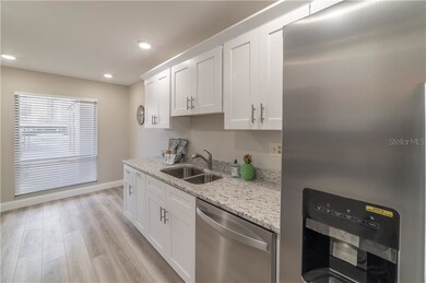 Plenty of cabinet space, and eat-in space in kitch