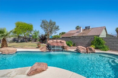 Refreshing Pool with Rock Waterfall Features perfe