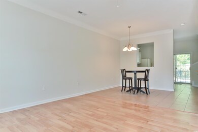Dining space featuring light hardwood / wood-style