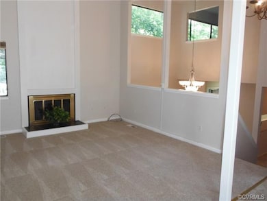 Great room view of loft overlook to dining room & 