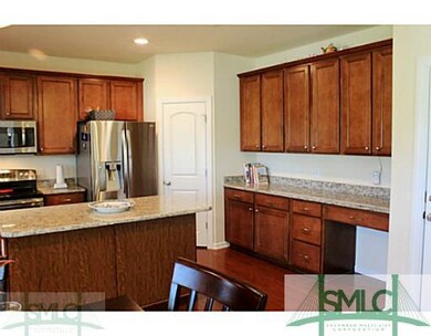 Kitchen. Tons of cabinets in the kitchen, a large 
