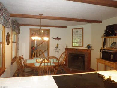 Breakfast room boast the second wood burning firep