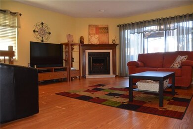 Beautiful fireplace is the highlight of the living