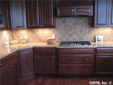 Kitchen. 5 burner gas stove in the Kenmore Ptrofes