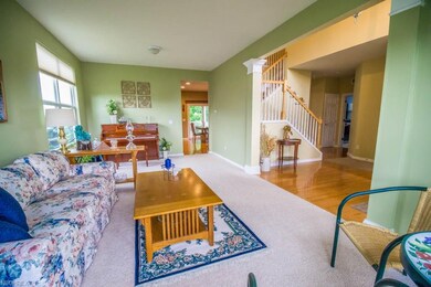 The living room is off of the foyer.