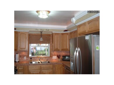 The newly remodeled kitchen boasts all new cabinet