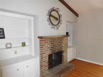 Brick fireplace in living room