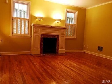 Living Room With Wood Burning Fireplace