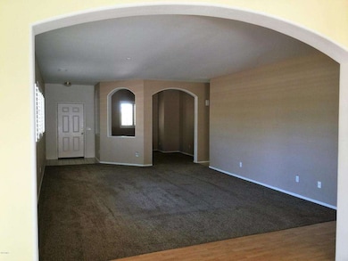 Living room den from arch