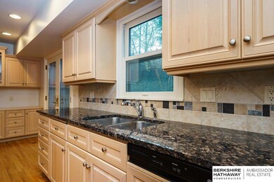 Dishwasher has custom cabinetry front.