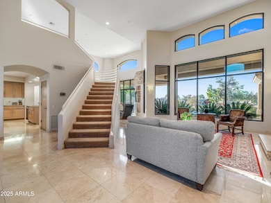 LivingRm Opens to Kitchen + Family Rm