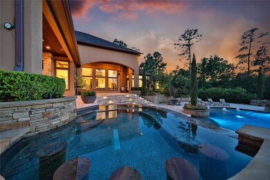 Dramatic custom pool designed on several levels that creates a magnificent resort style living which embraces a spectacular setting that magically intertwines serenity and relaxation.