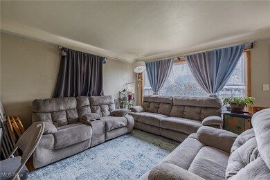 Living room featuring a textured ceiling