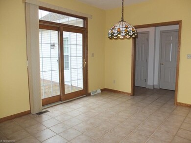 Dinette with tile floor.